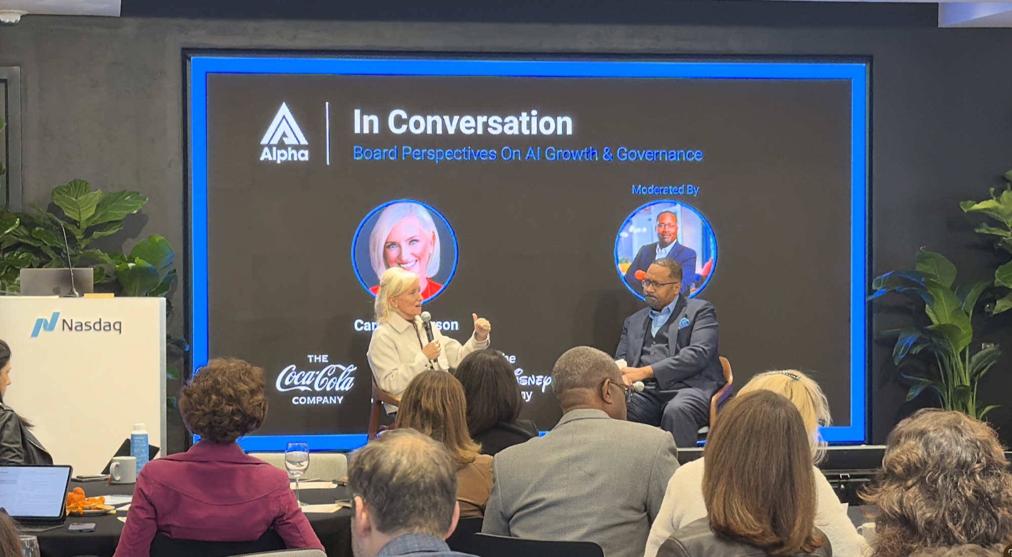 Board directors in conversation onstage at an Alpha event at Nasdaq MarketSite.